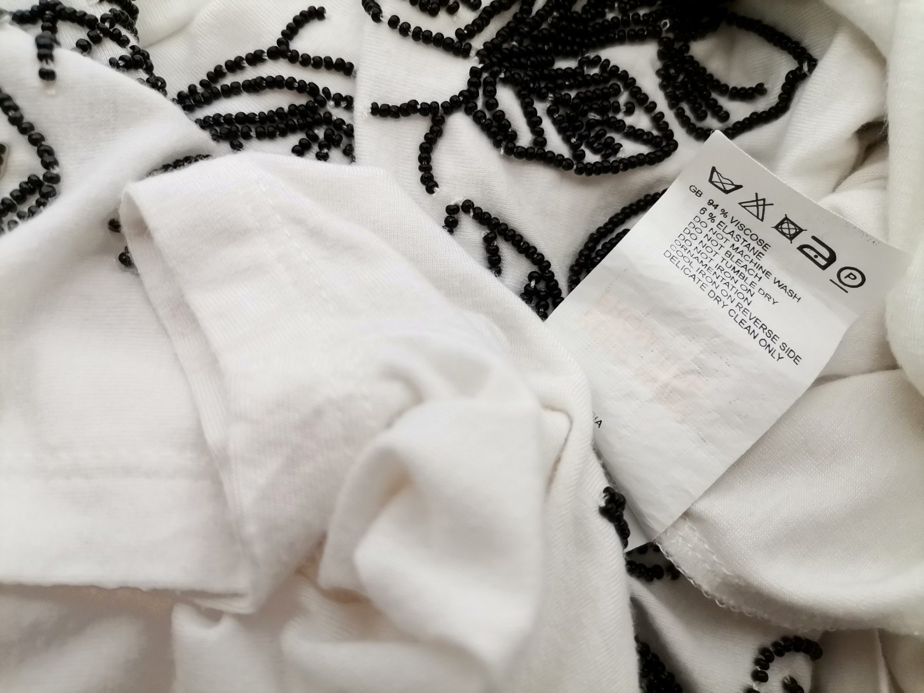 Reiss Size L Color Biały Roślinny Liście Okrągły dekolt Tunika Bluzka Krótki rękaw Fabric Wiskoza